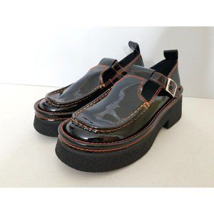 Miista Black Platform Shoes with Orange Stitching